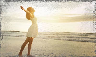 StandUpGirl girl stands in sun on beach