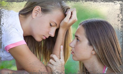 StandUpGirl girl supporting girl with hand on head 